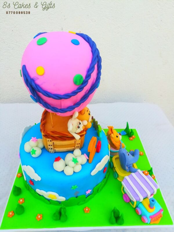 pets on balloon cake