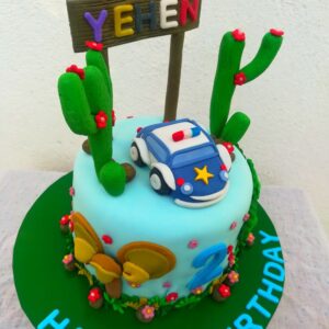 cop car in the dessert cake