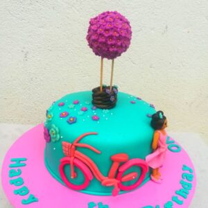 Girl with bicycle cake idea