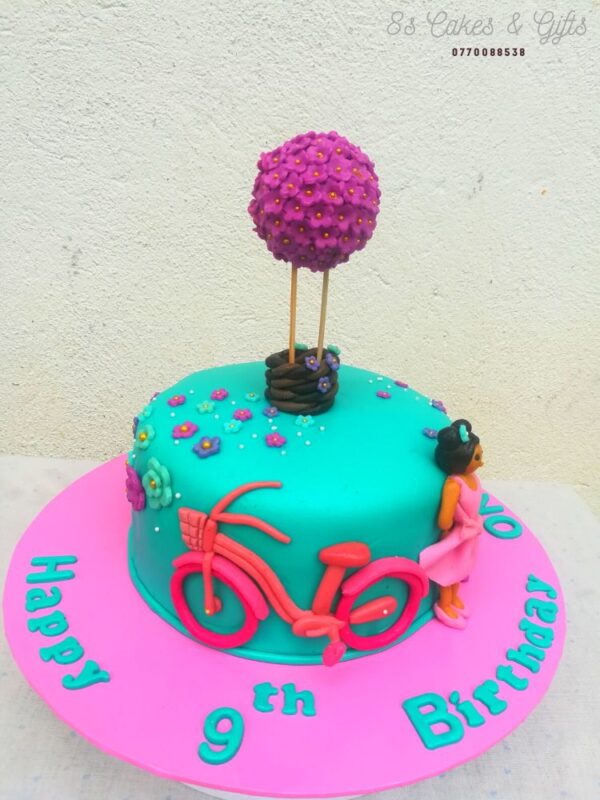 Girl with bicycle cake idea